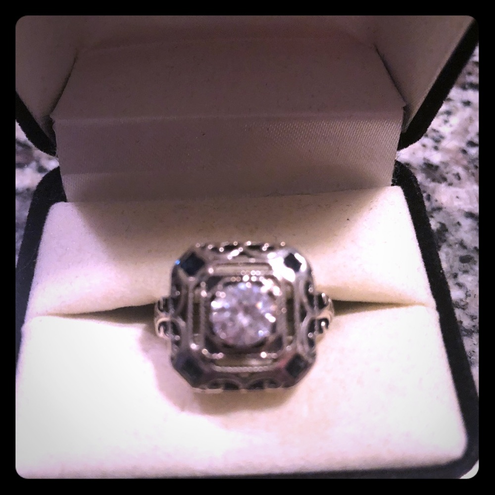 White topaz and blue topaz ring